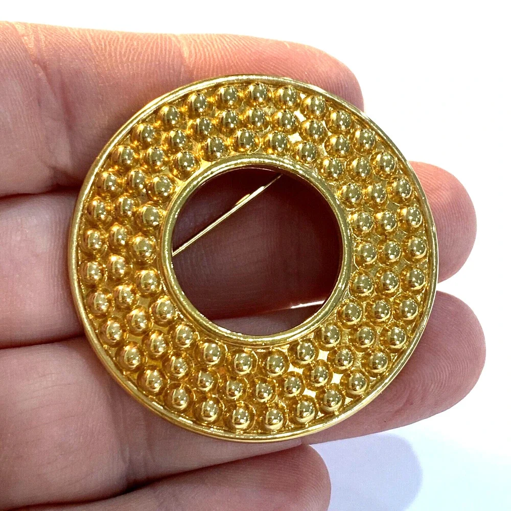 Vintage Swarovski brooch SAL goldtone textured open circle round retro pin 1980s